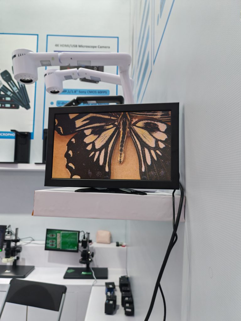Phantrue Document Visualizer in H.K fair, showing demonstrating biology diagrams with 4K zoom.