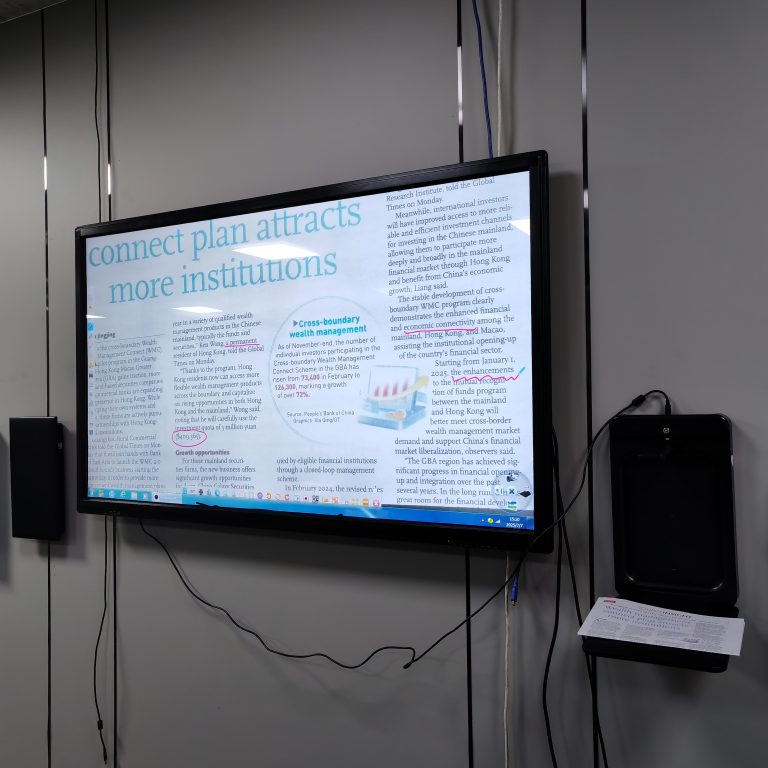 FT-F906B document camera projecting a textbook onto a classroom screen