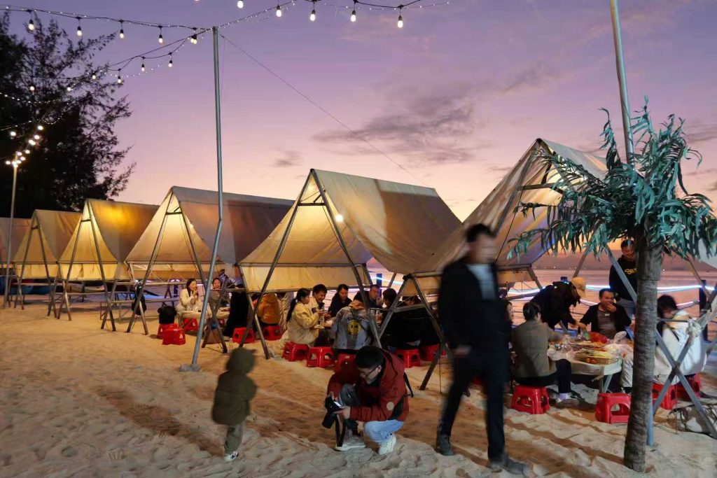 Phantrue team enjoying BBQ dinner at Huizhou Beach during 2025 team building